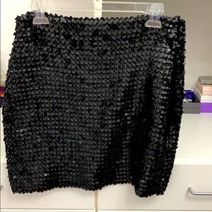 Stretchy black sequin skirt.